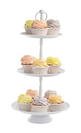 Photo of Dessert stand with tasty cupcakes on white background