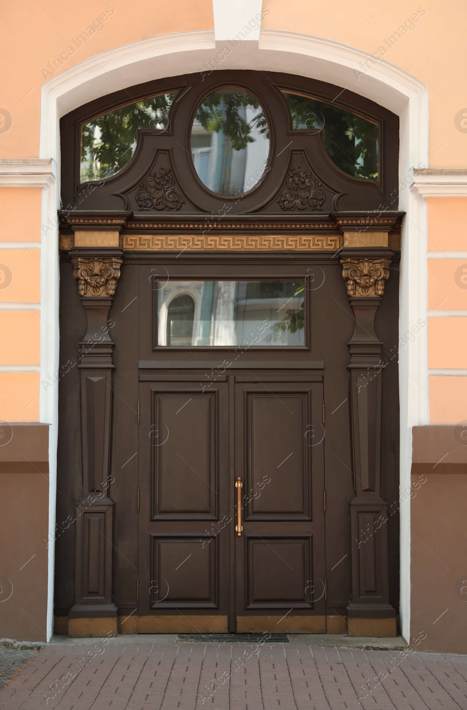 Photo of Building with vintage wooden door. Exterior design