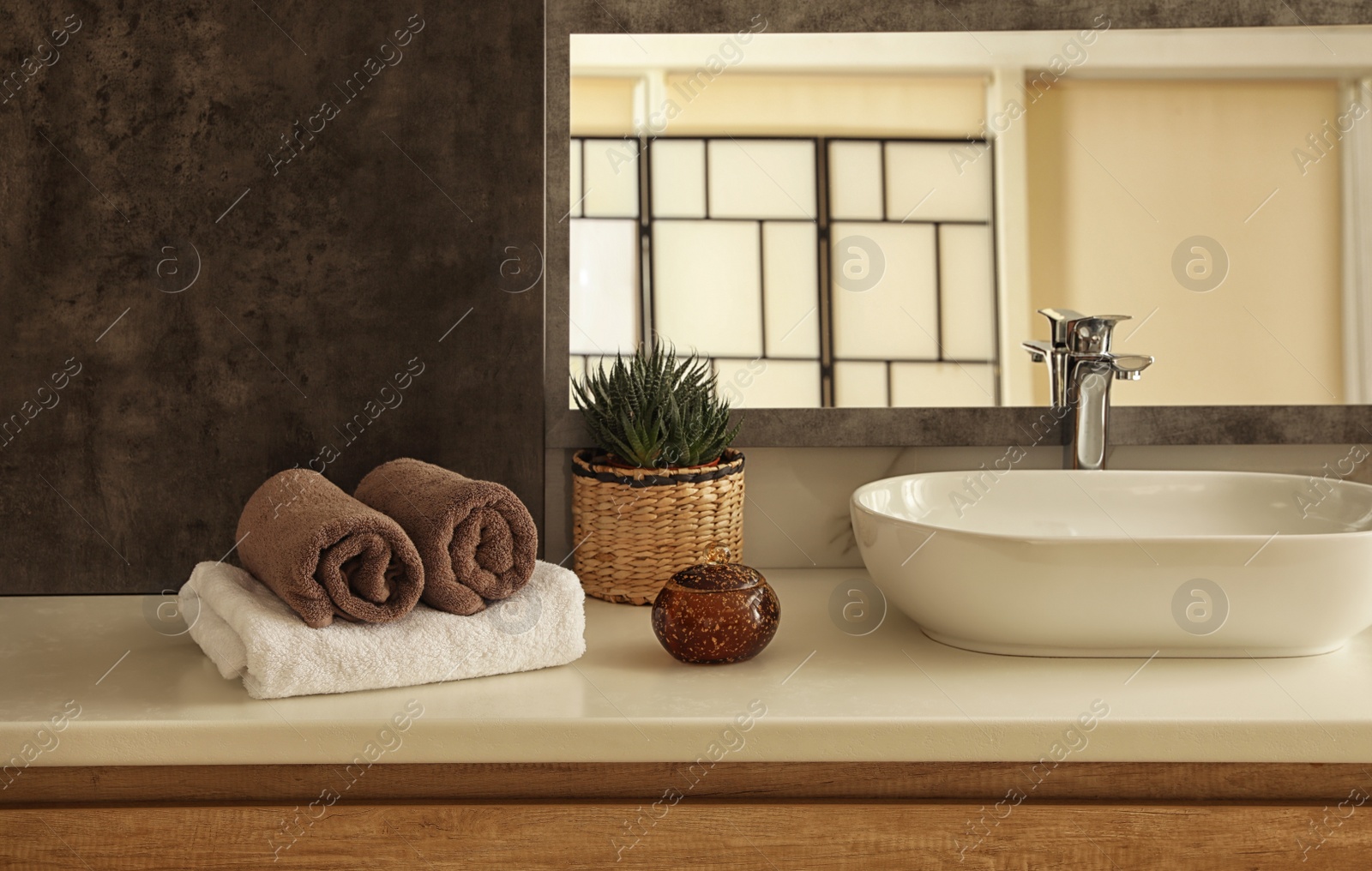 Photo of Modern bathroom interior with stylish mirror and vessel sink