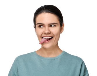 Photo of Happy young woman showing her tongue on white background