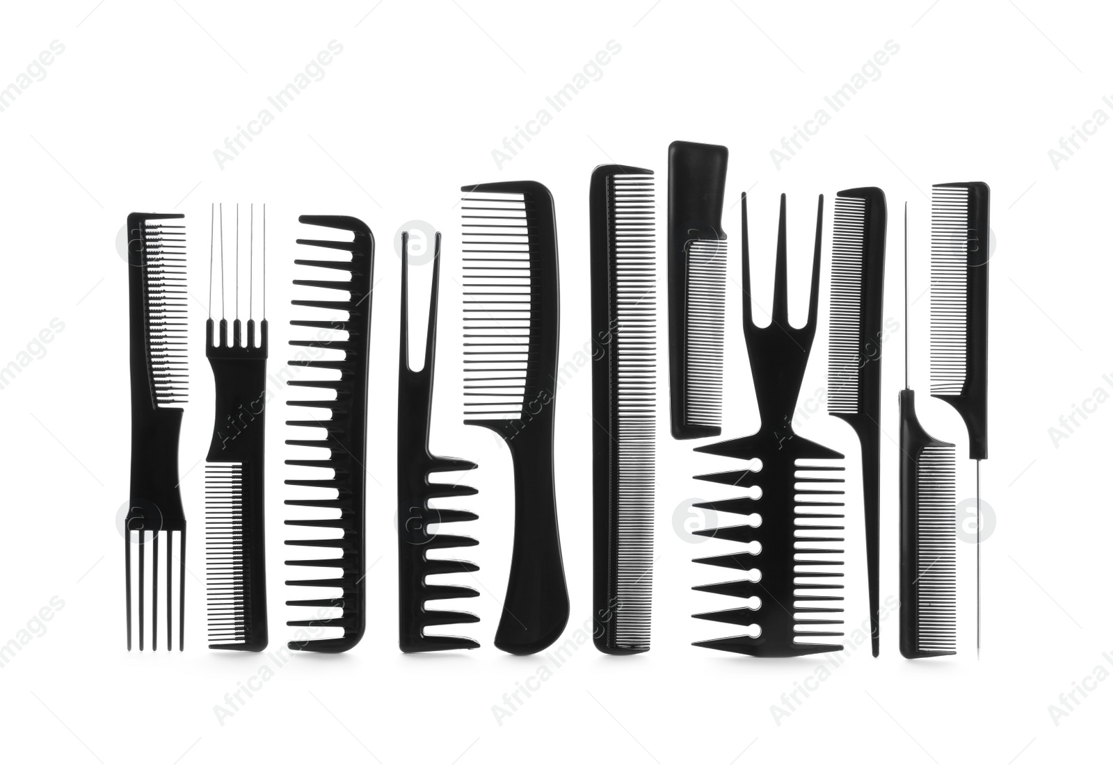 Photo of Set of professional hair combs isolated on white, top view