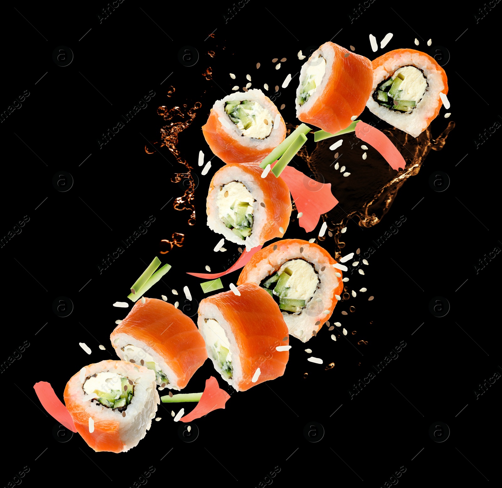 Image of Delicious sushi rolls and ingredients on black background