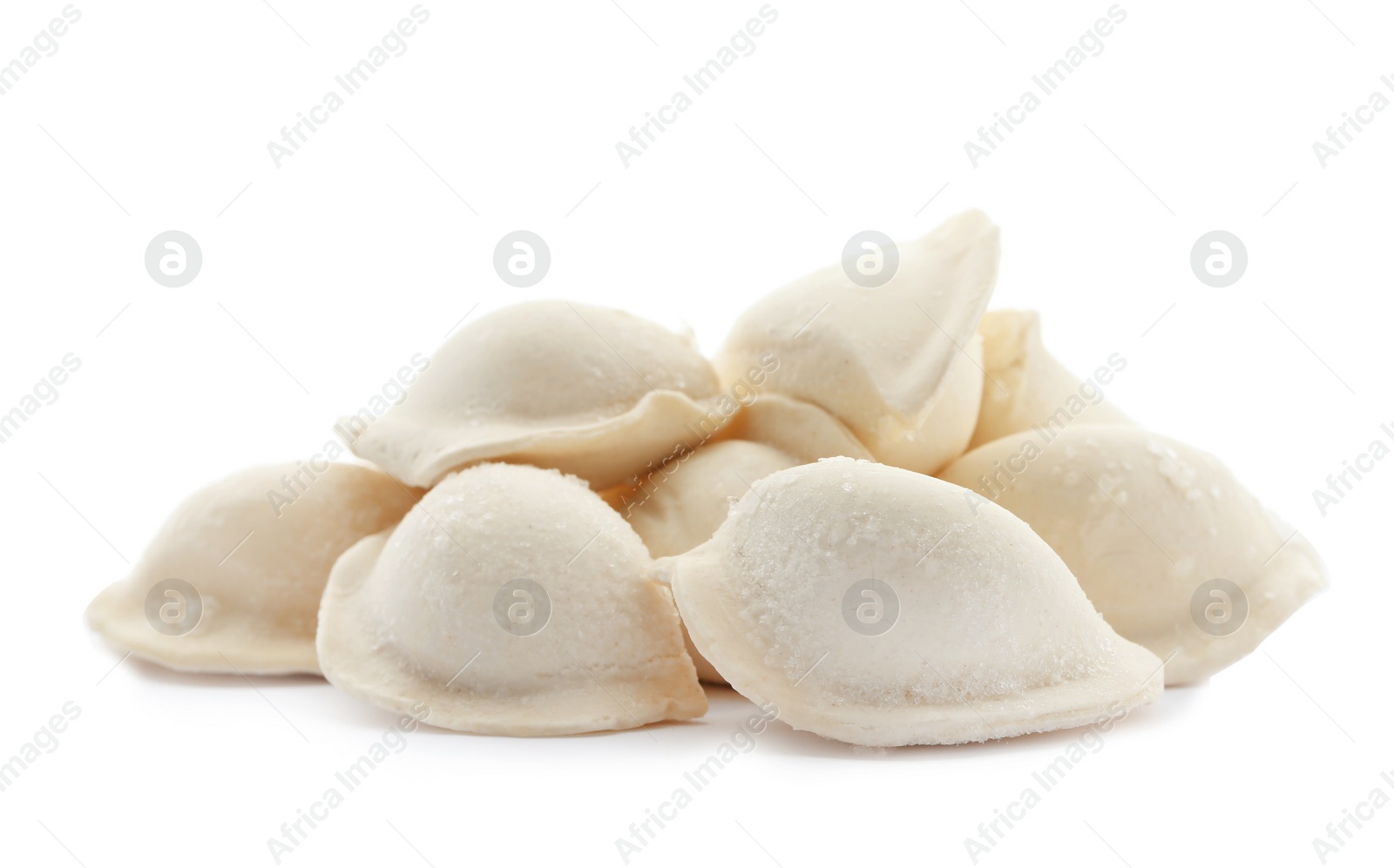 Photo of Heap of raw dumplings on white background