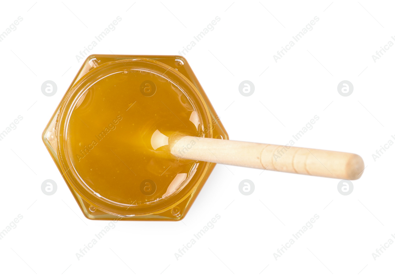 Photo of Tasty honey and dipper in glass jar isolated on white, top view