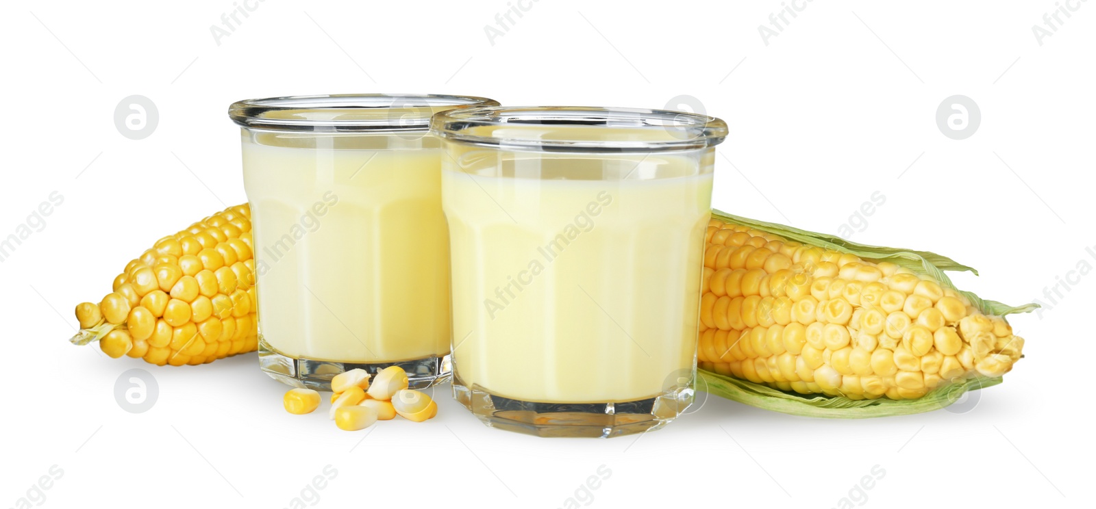 Photo of Tasty fresh corn milk in glasses and cobs on white background