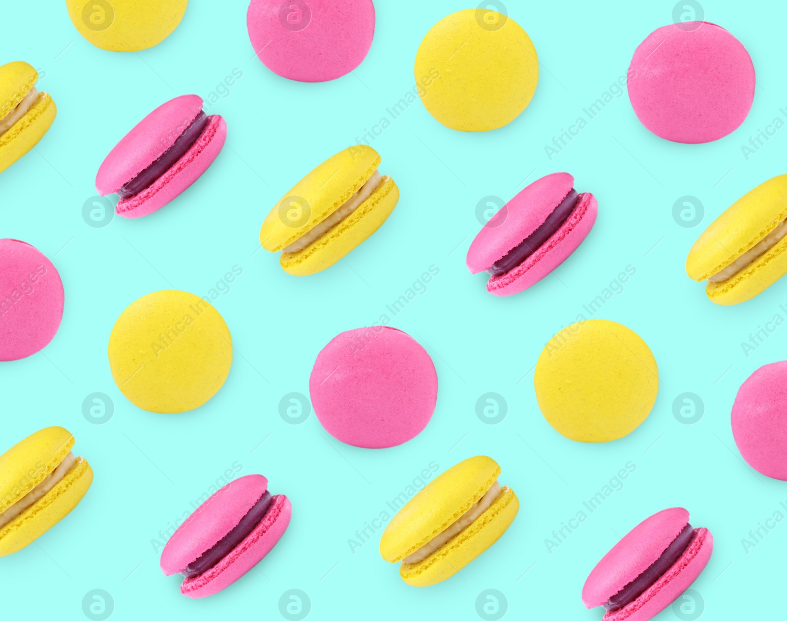 Image of Delicious macarons on turquoise background, flat lay 