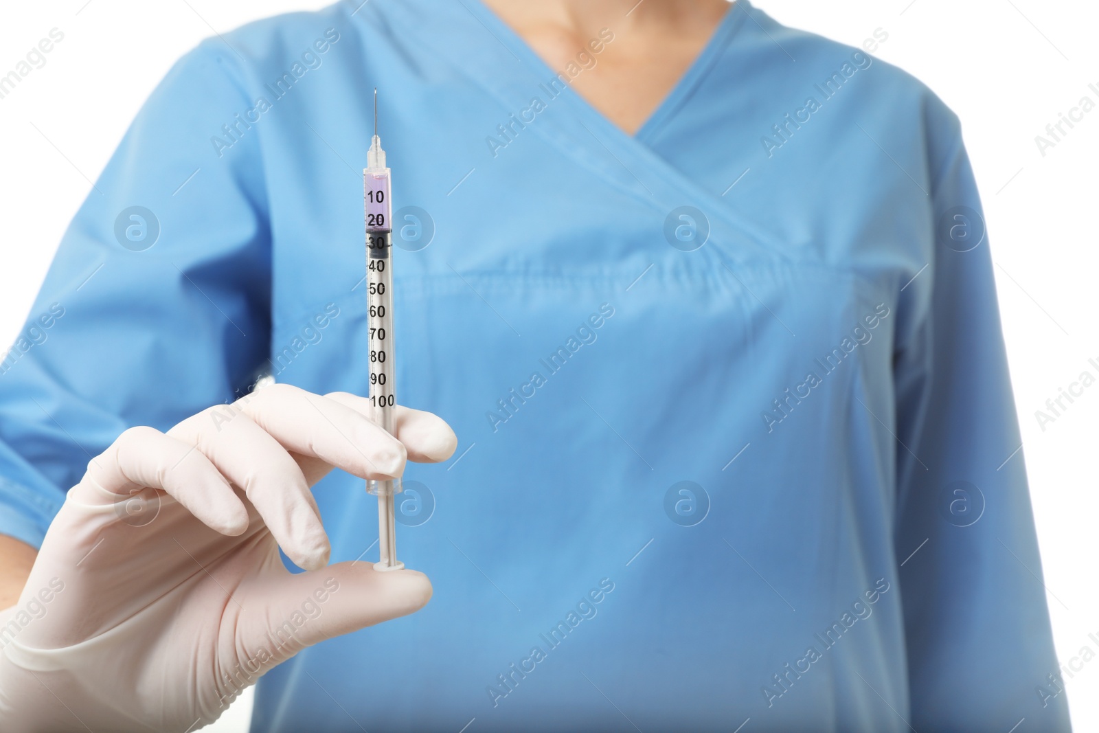 Photo of Female doctor with syringe on white background, closeup. Medical object