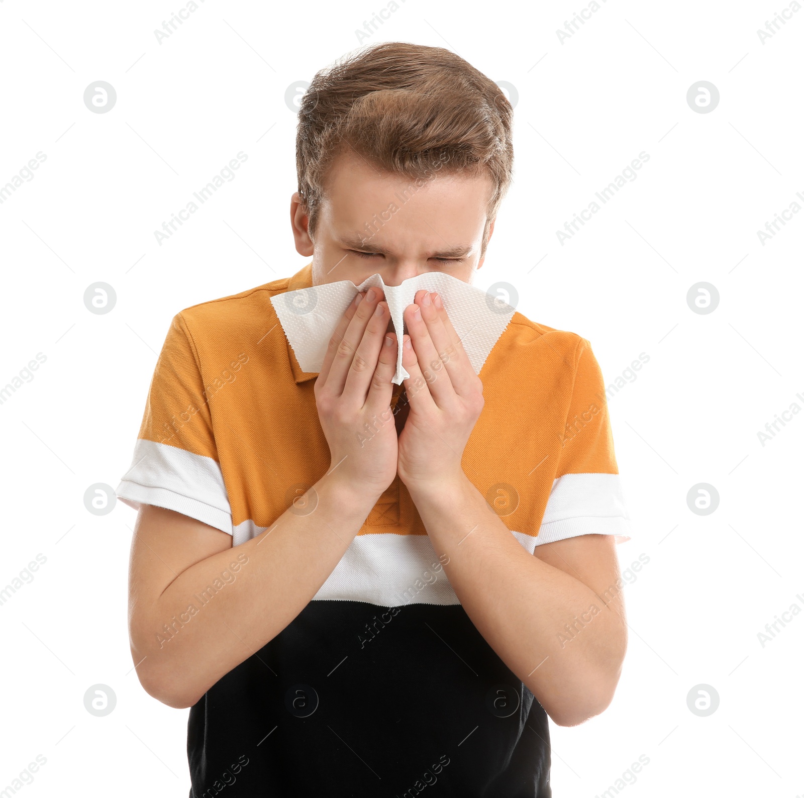 Photo of Teenage boy suffering from cough isolated on white