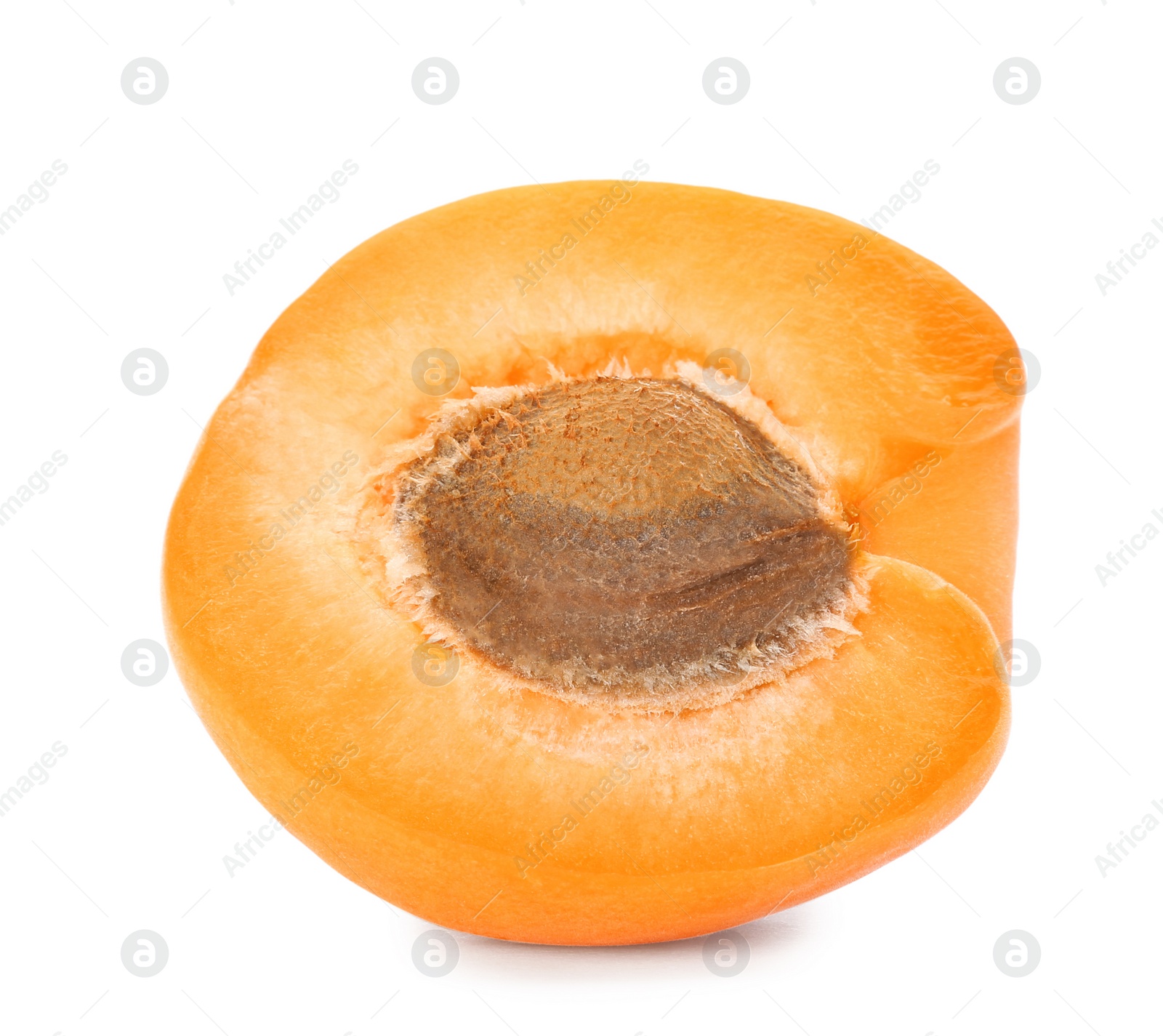 Photo of Half of delicious ripe apricot with stone isolated on white