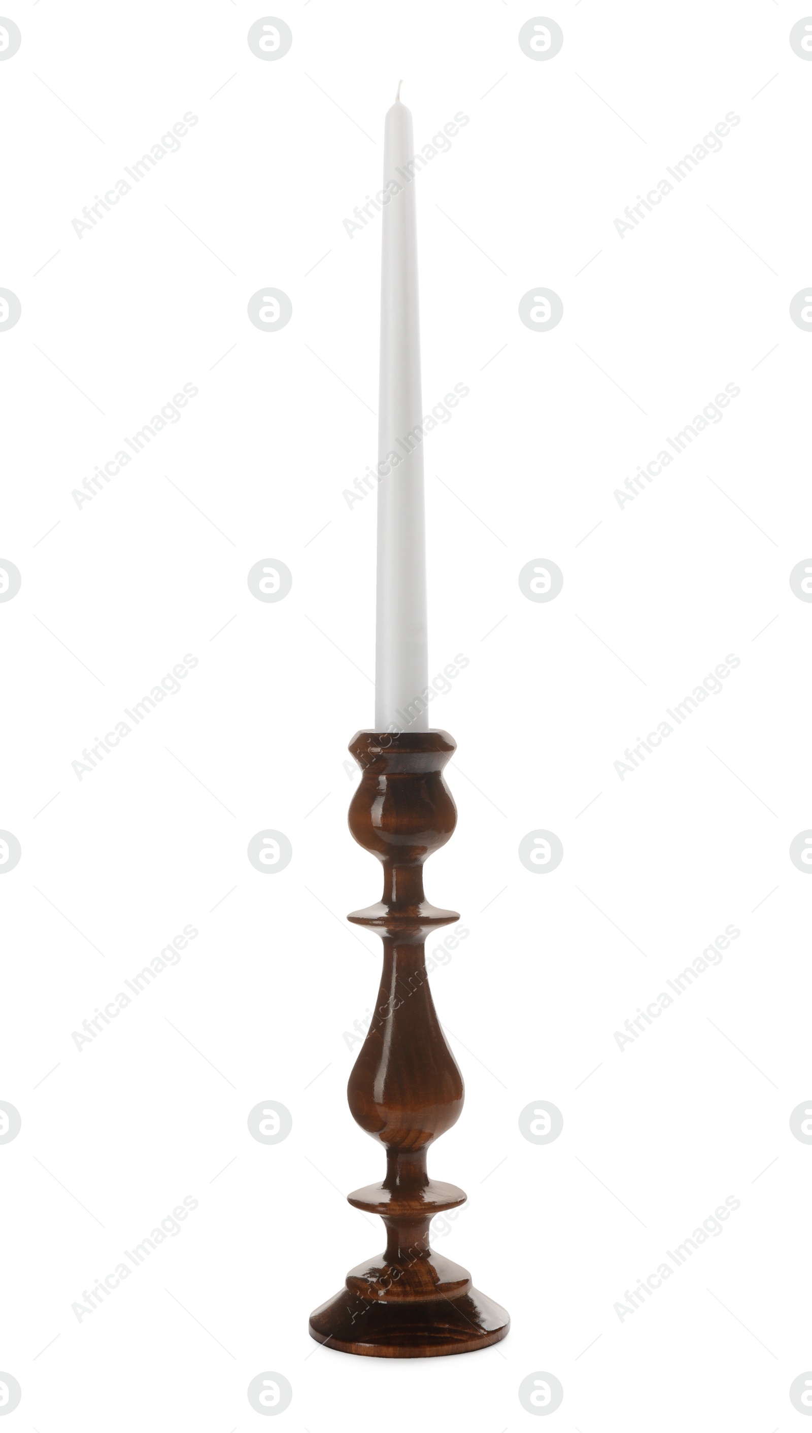 Photo of Elegant candlestick with candle isolated on white