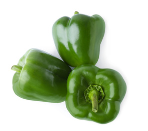 Photo of Ripe green bell peppers isolated on white, top view