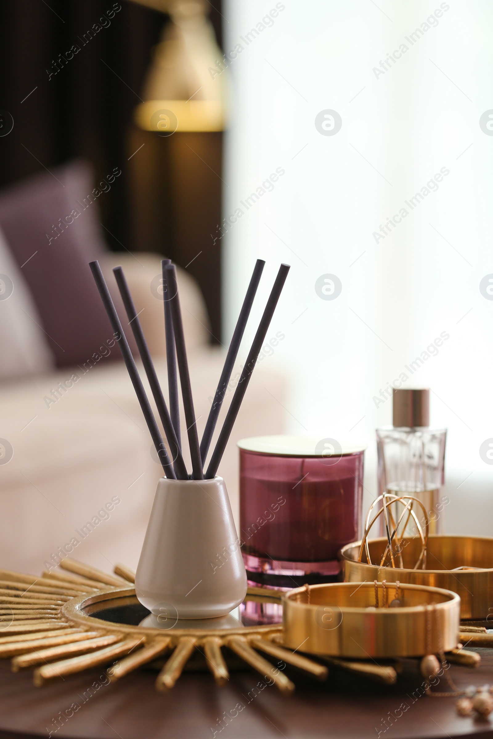 Photo of Composition with stylish accessories and interior elements on table indoors