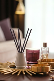 Composition with stylish accessories and interior elements on table indoors