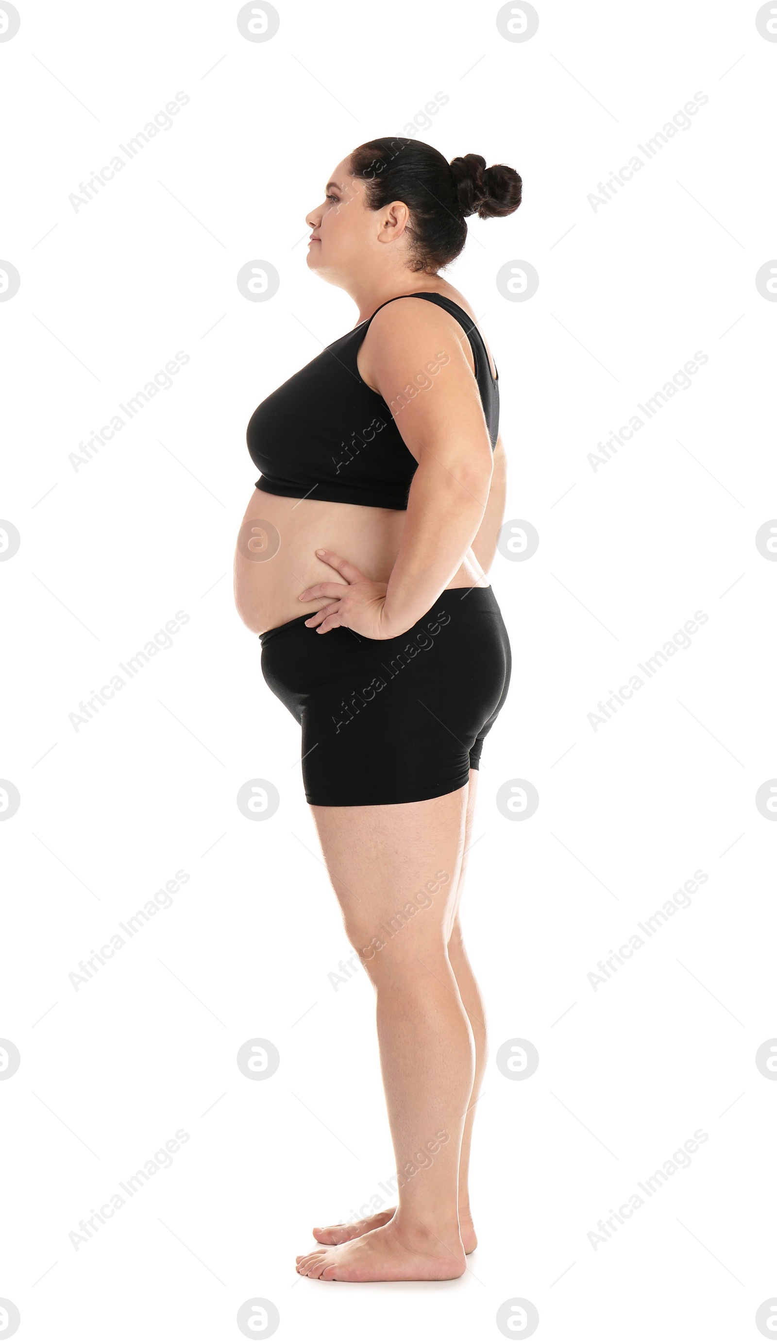 Photo of Full length portrait of fat woman on white background. Weight loss