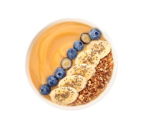Photo of Delicious smoothie bowl with fresh blueberries, banana and granola on white background, top view