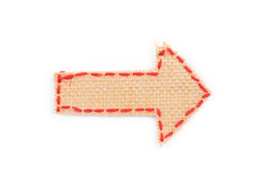 Photo of Arrow made of burlap fabric with red stitches isolated on white, top view
