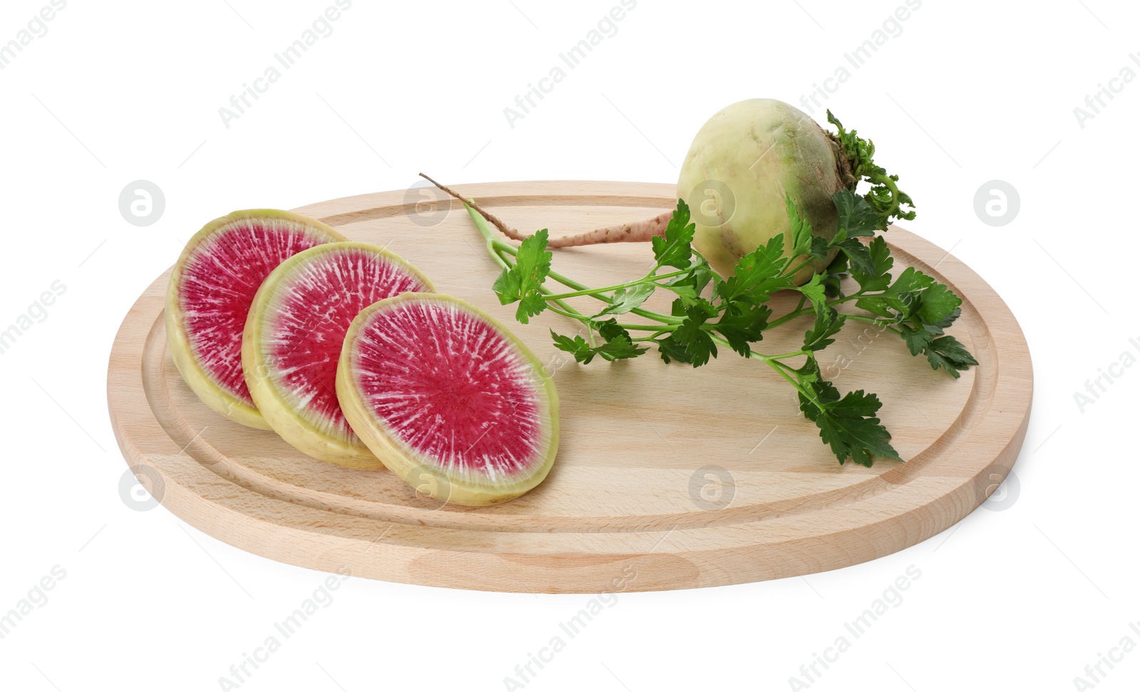 Photo of Wooden cutting board with fresh red meat radishes and parsley isolated on white