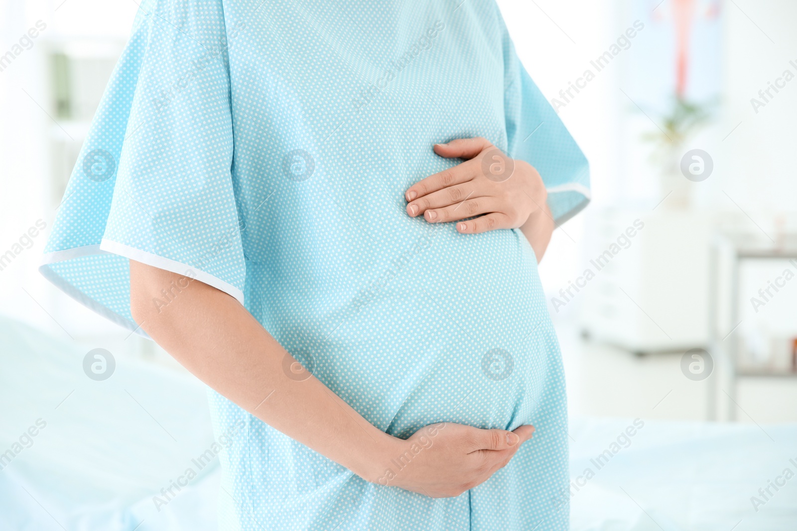 Photo of Gynecology consultation. Pregnant woman in modern clinic