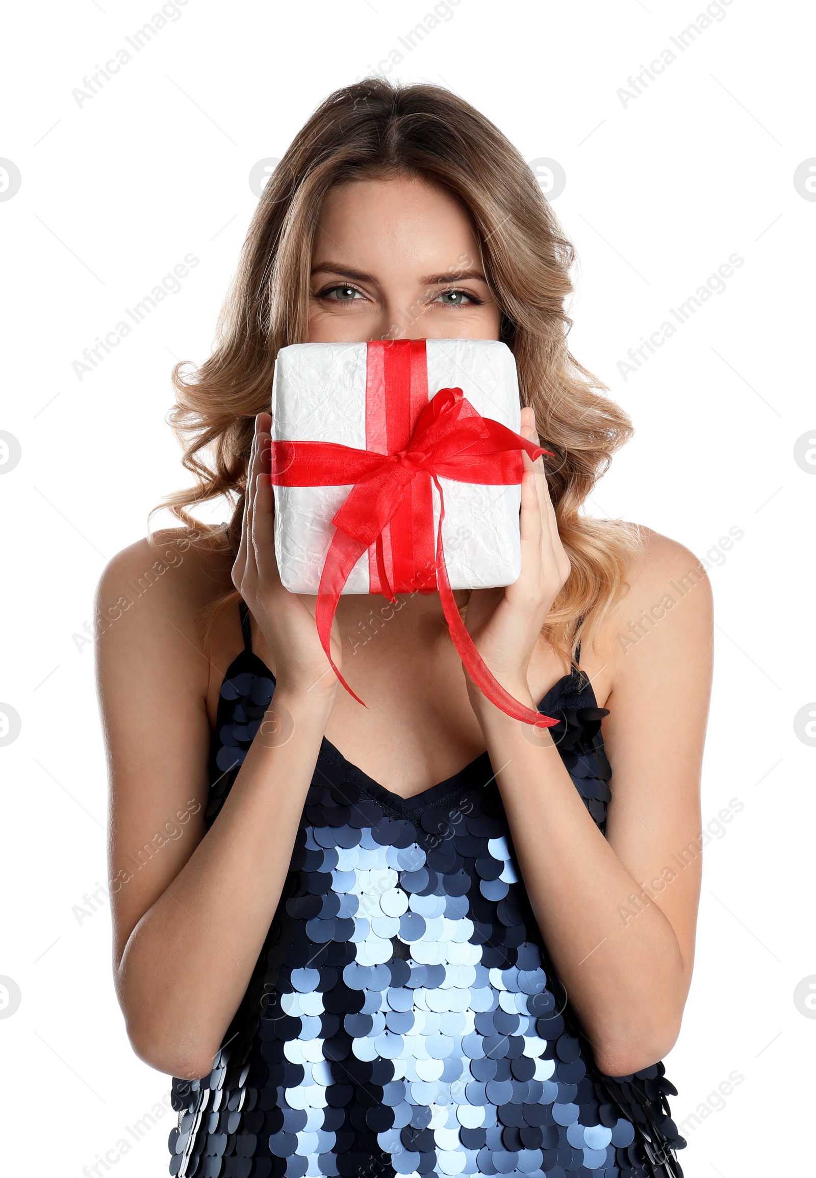 Photo of Beautiful young woman with Christmas present on white background