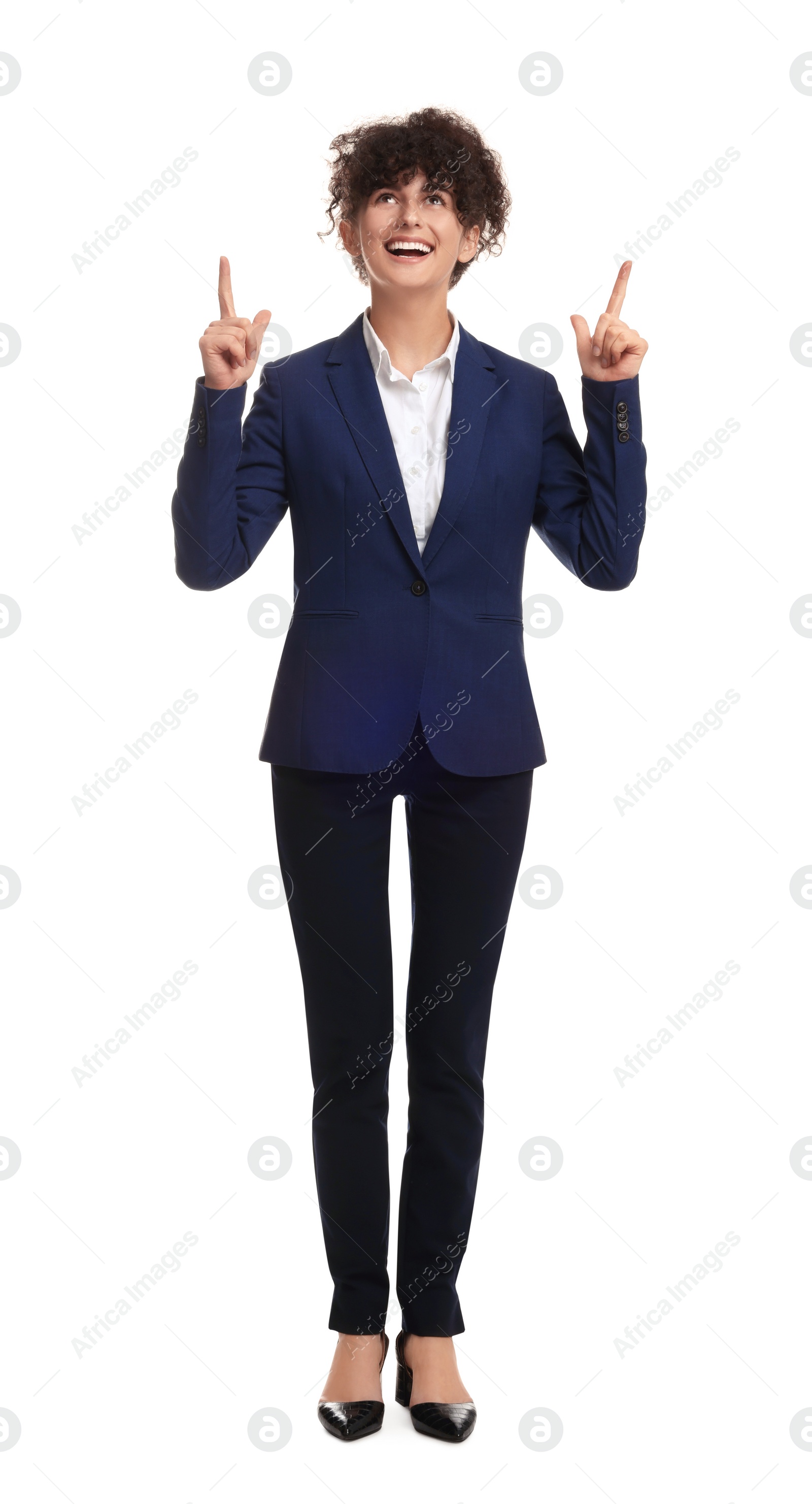 Photo of Beautiful businesswoman in suit showing thumbs up on white background