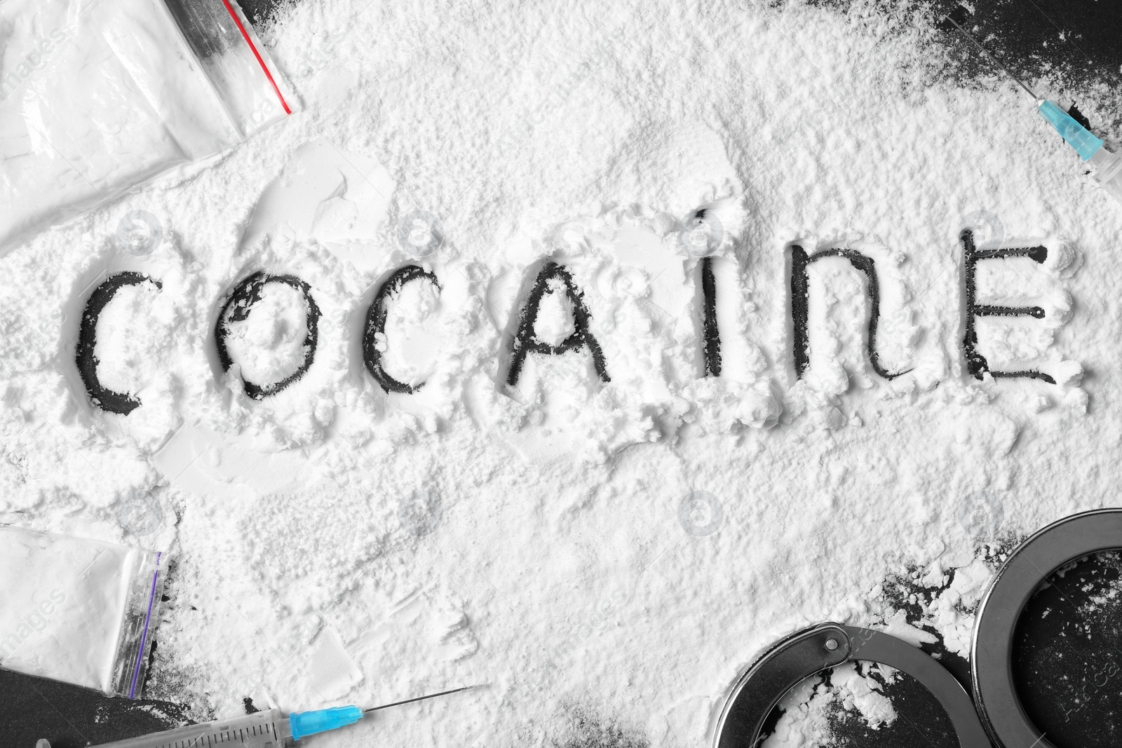 Photo of Composition with cocaine powder on black background, top view