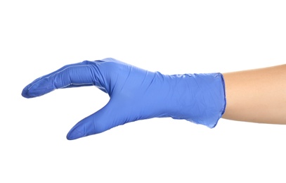 Woman in blue latex gloves holding something on white background, closeup of hand