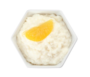 Photo of Creamy rice pudding with orange slice in bowl on white background, top view