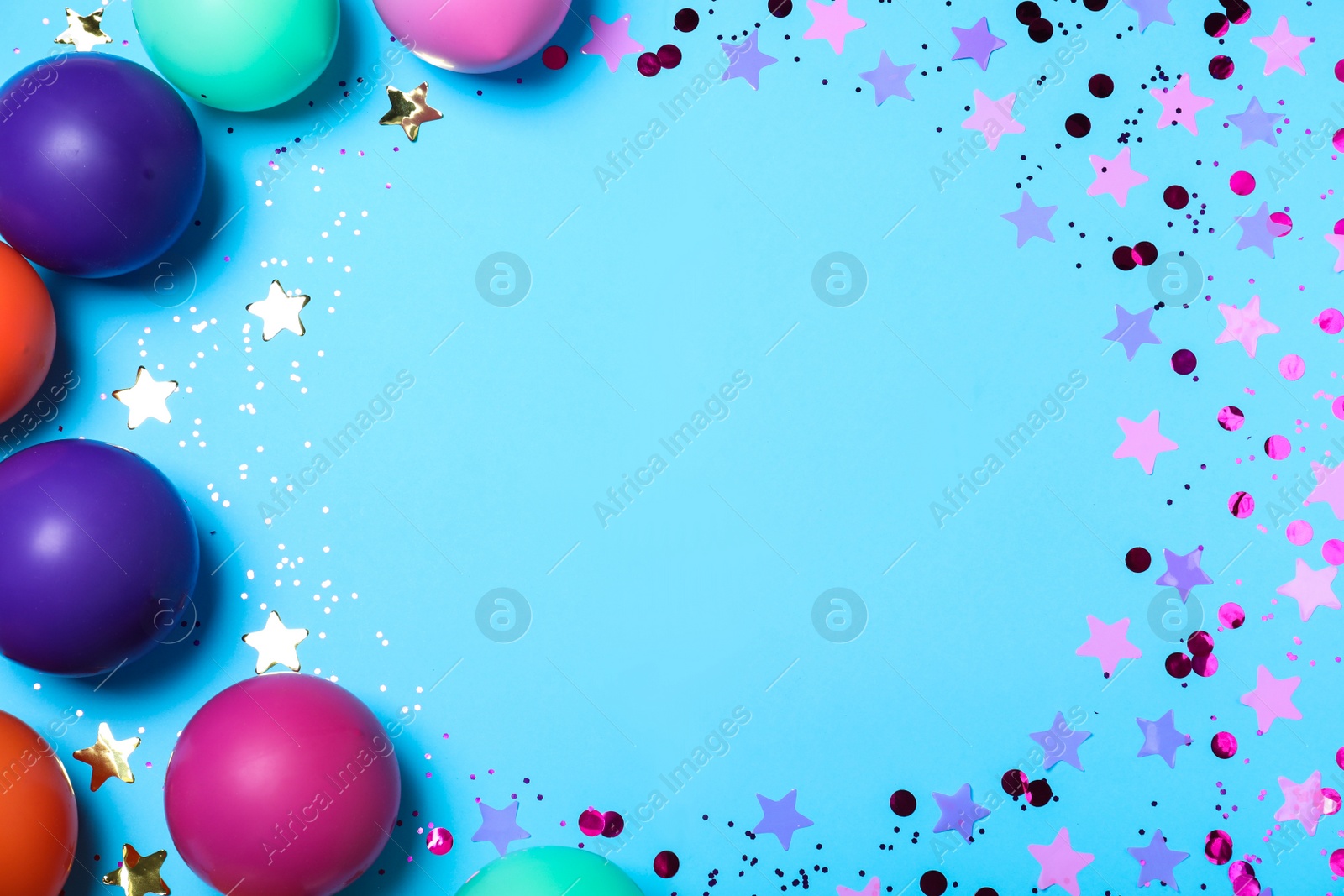 Photo of Frame of balloons and confetti on light blue background, flat lay with space for text. Birthday decor