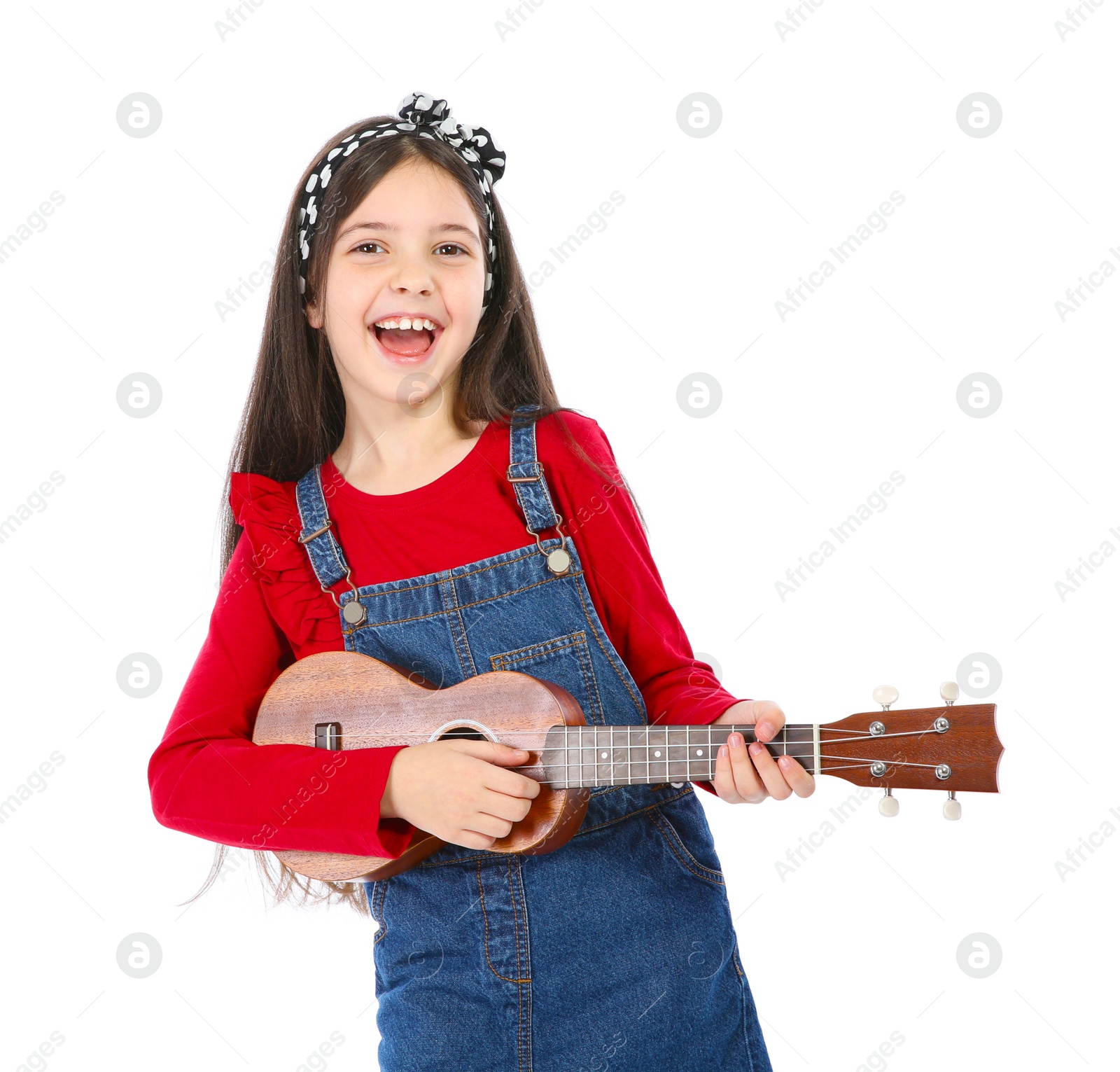 Photo of Portrait of little girl playing guitar, isolated on white