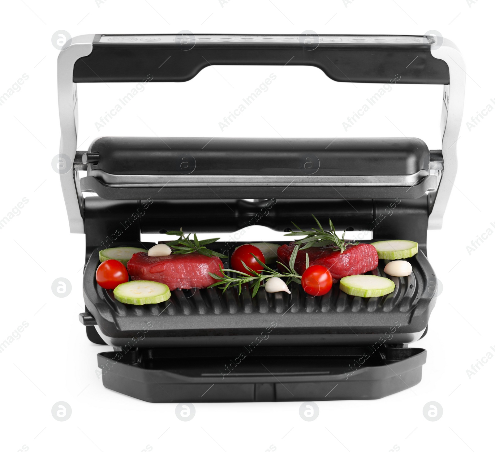 Photo of Electric grill with raw meat, rosemary and vegetables isolated on white