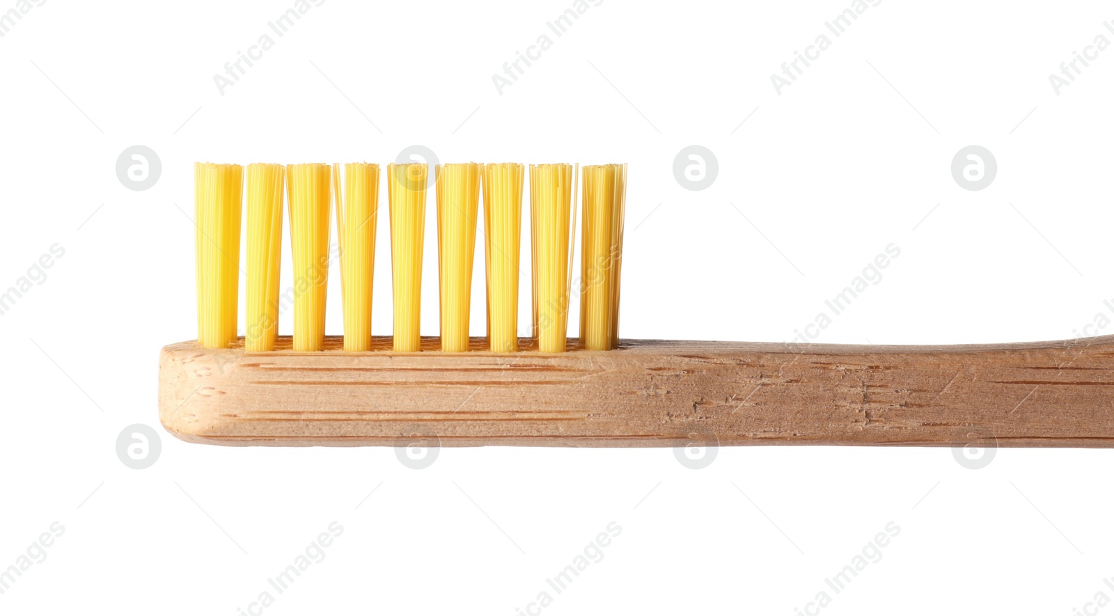 Photo of Toothbrush made of bamboo on white background, closeup