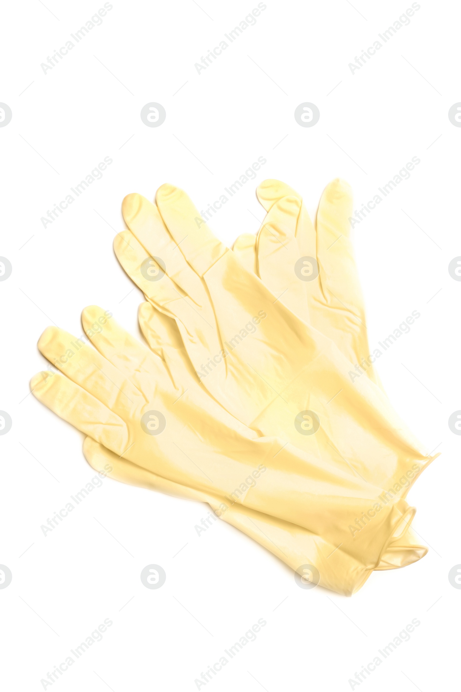 Photo of Medical gloves on white background, top view