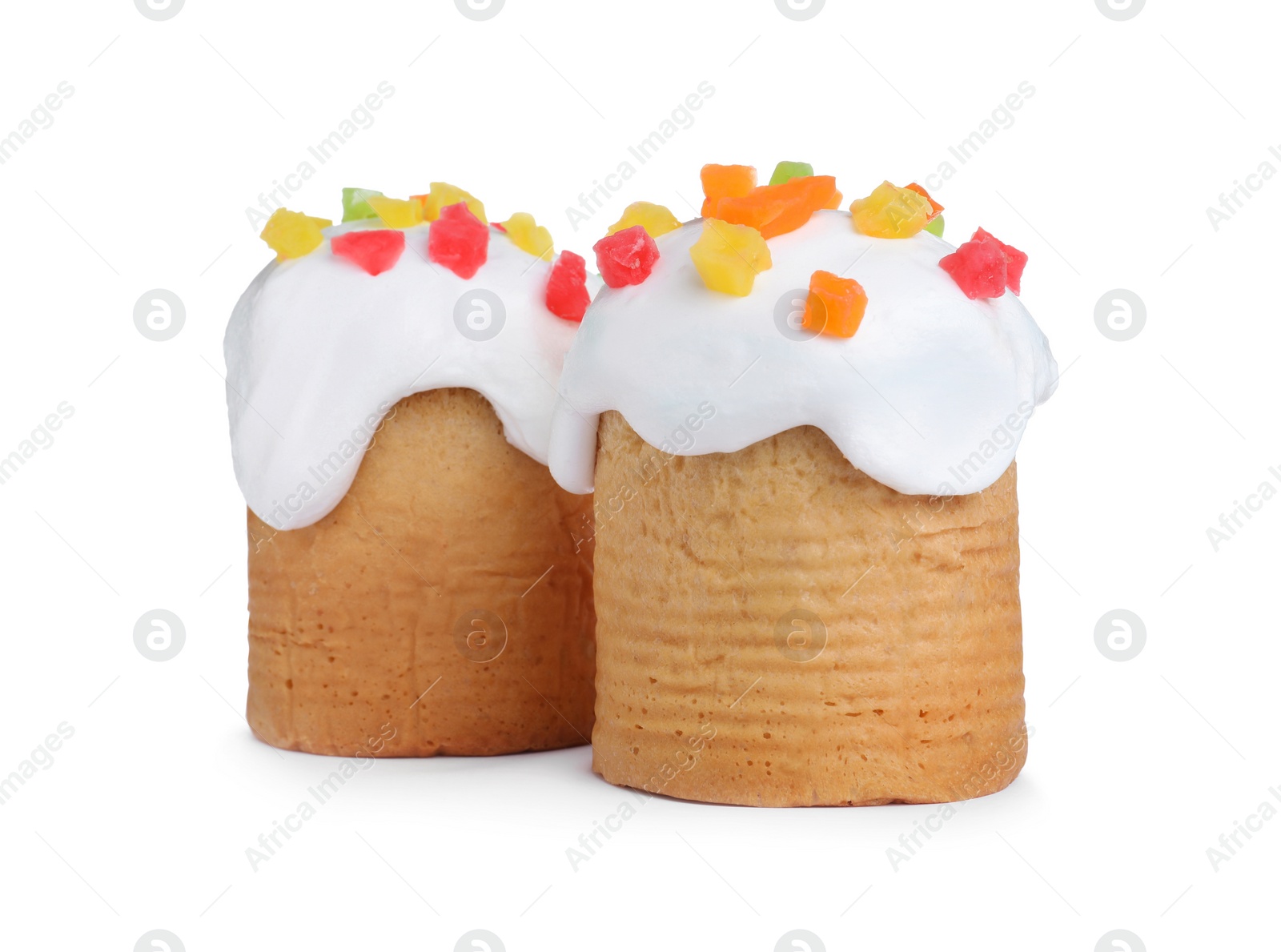 Photo of Traditional decorated Easter cakes on white background