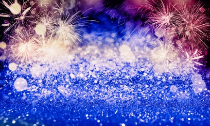 Image of 4th of July - Independence Day of USA. Festive background with fireworks and glitters, bokeh effect