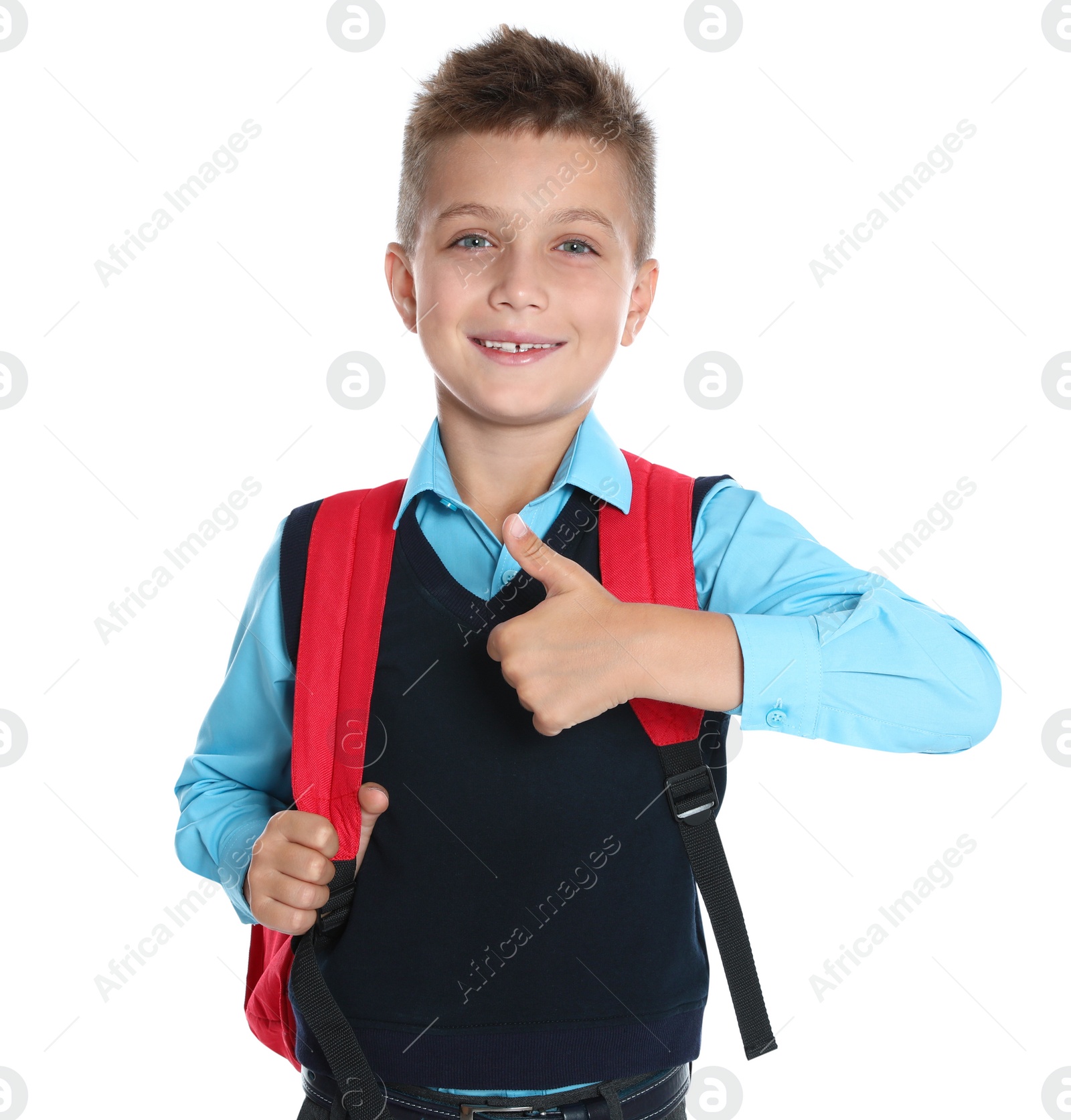 Photo of Happy boy in school uniform on white background