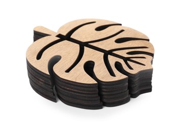 Photo of Stack of leaf shaped wooden cup coasters on white background