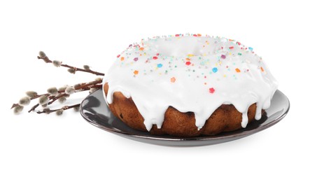 Photo of Easter cake with sprinkles and willow branches isolated on white