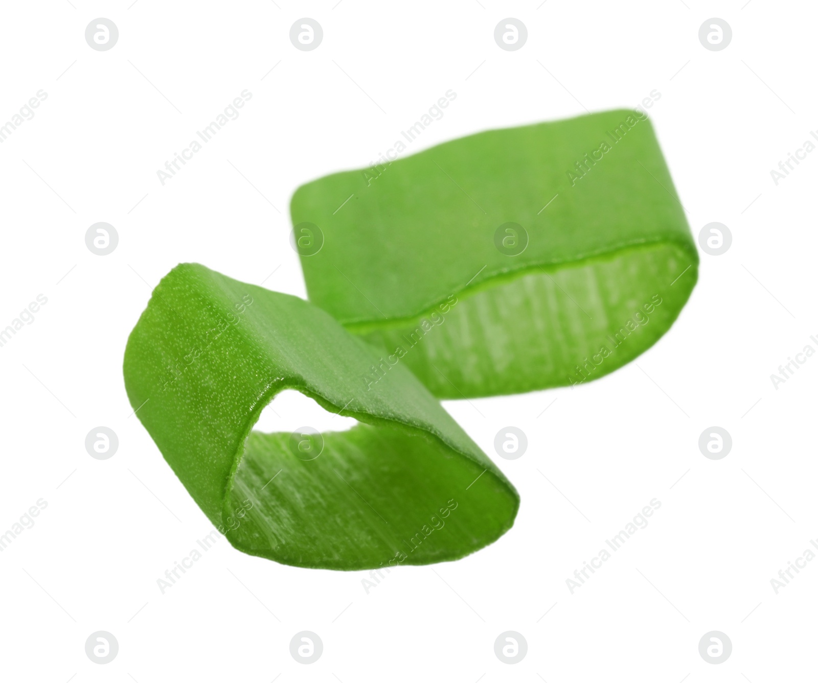 Photo of Pieces of fresh green onion isolated on white