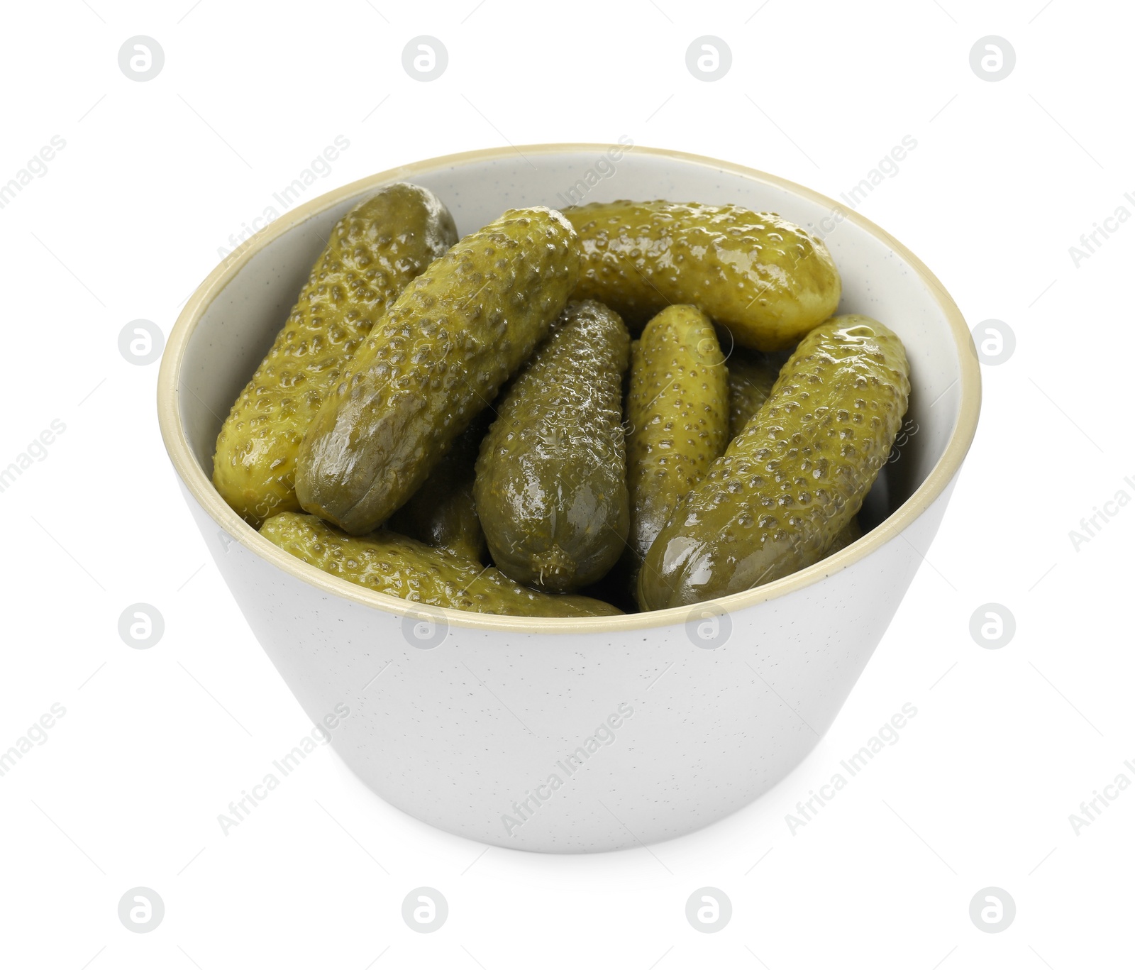 Photo of Tasty pickled cucumbers in bowl isolated on white