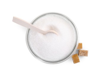 Photo of Different types of sugar and glass jar isolated on white, top view