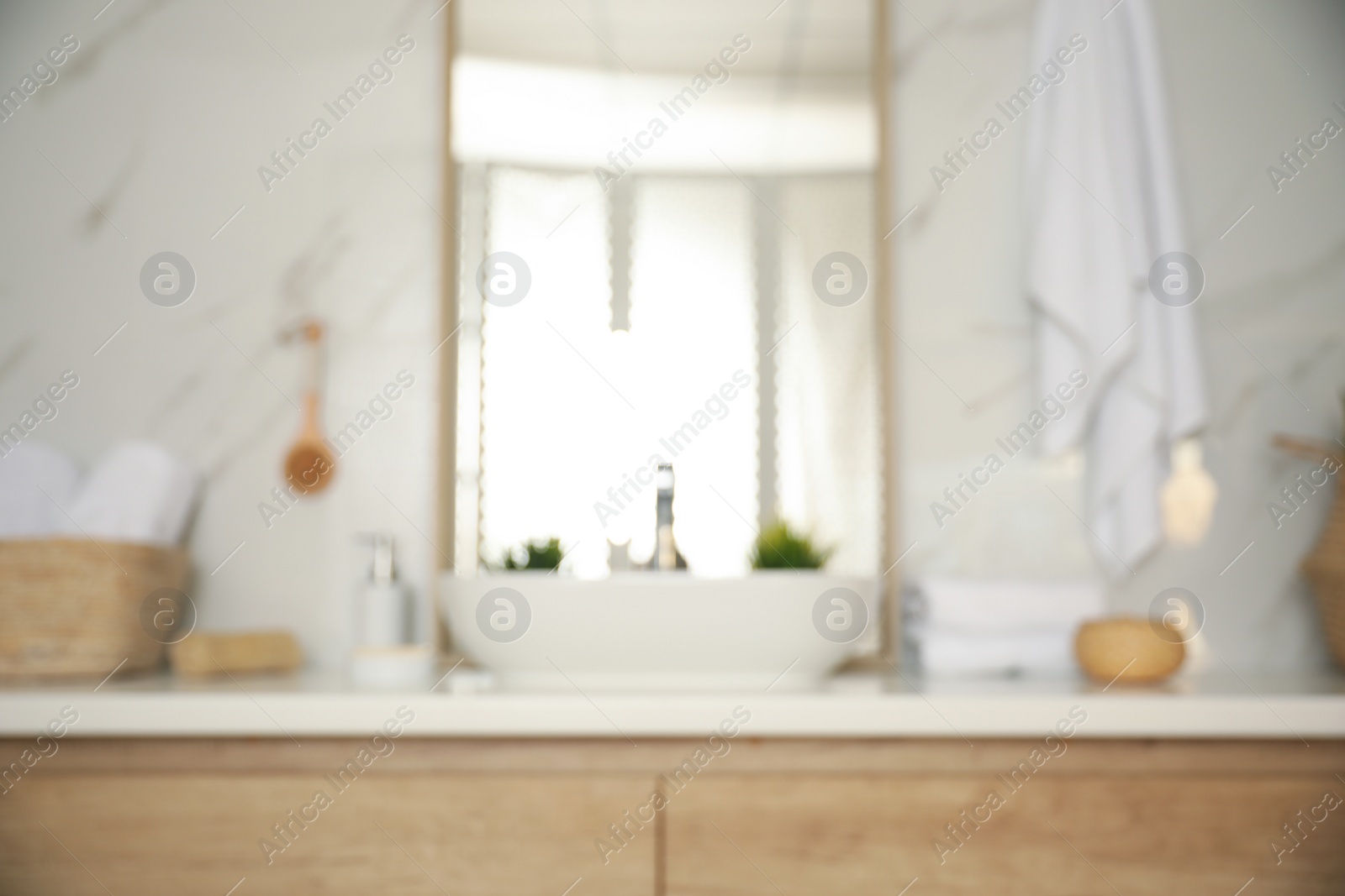 Photo of Blurred view of light modern bathroom interior