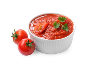 Photo of Homemade tomato sauce in bowl and fresh ingredients isolated on white