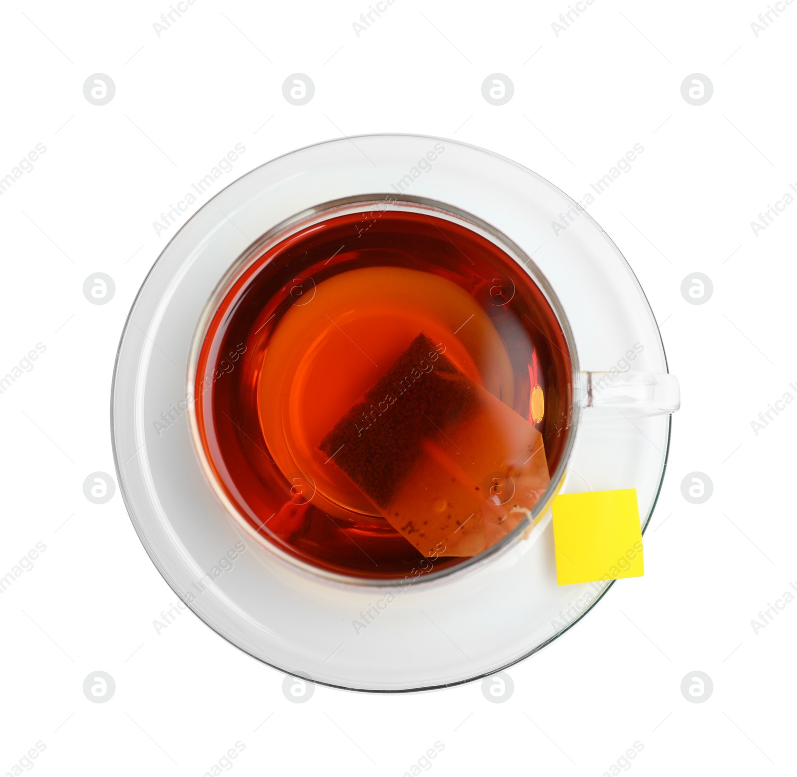 Photo of Hot tea in glass cup on white background, top view