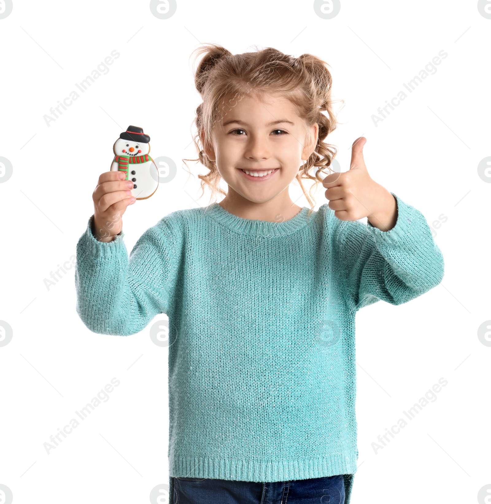 Photo of Cute little girl with Christmas gingerbread cookie on white background