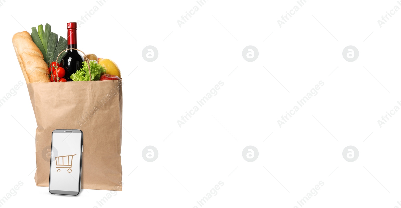 Image of Online purchases. Smartphone with shopping cart icon and paper bag full of different products on white background