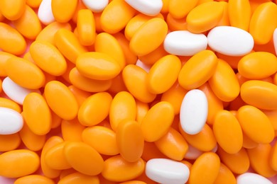 Photo of Many bright dragee candies as background, closeup