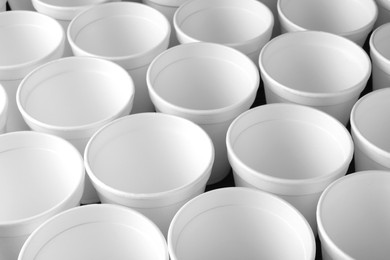 Photo of Closeup view of many white styrofoam cups