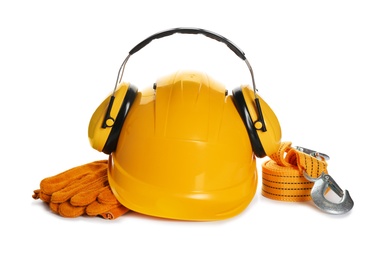 Photo of Protective workwear on white background. Safety equipment