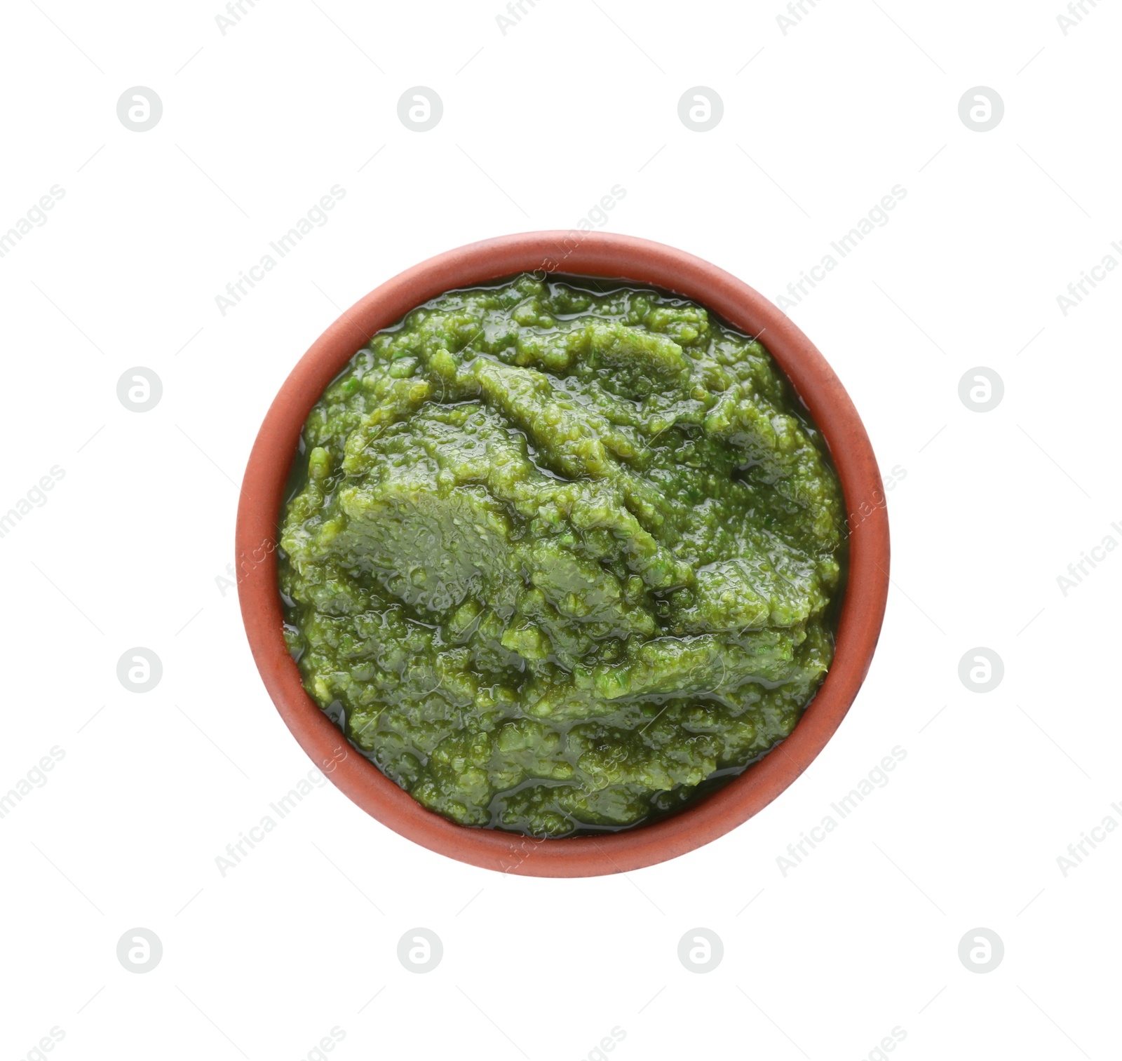 Photo of Delicious vegetable puree in bowl isolated on white, top view. Healthy food