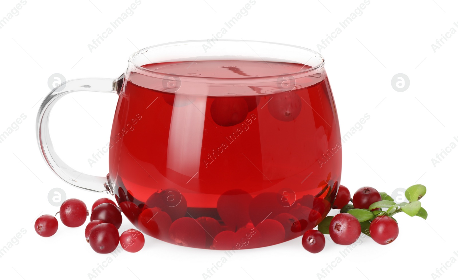 Photo of Cup of delicious cranberry tea and berries isolated on white